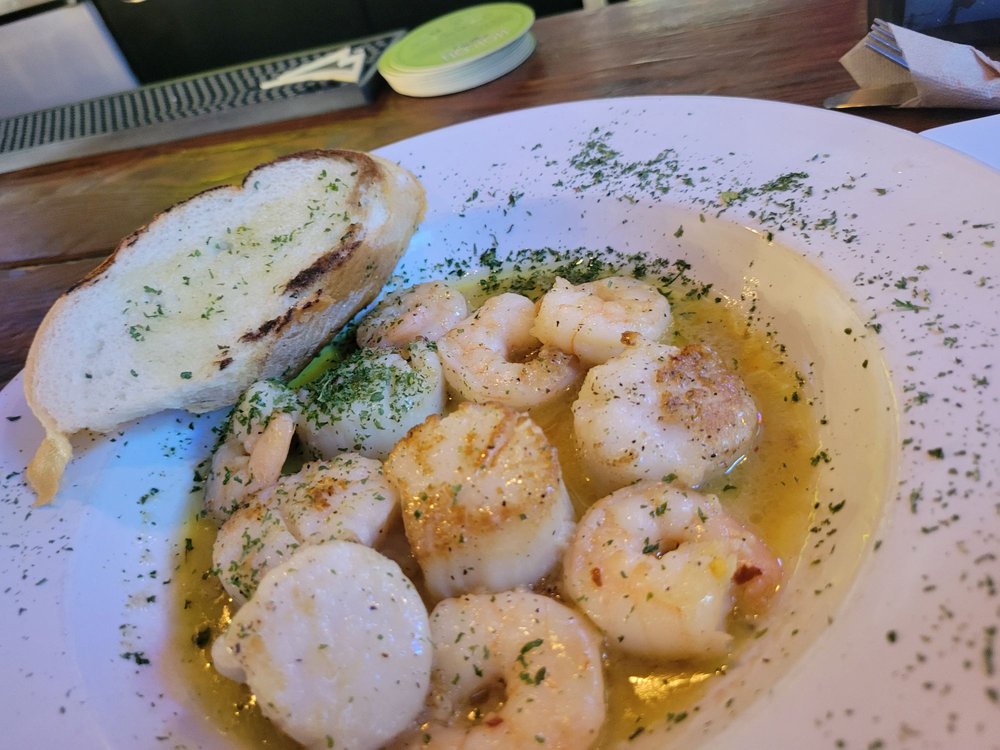 A plate of scallops and shrimp