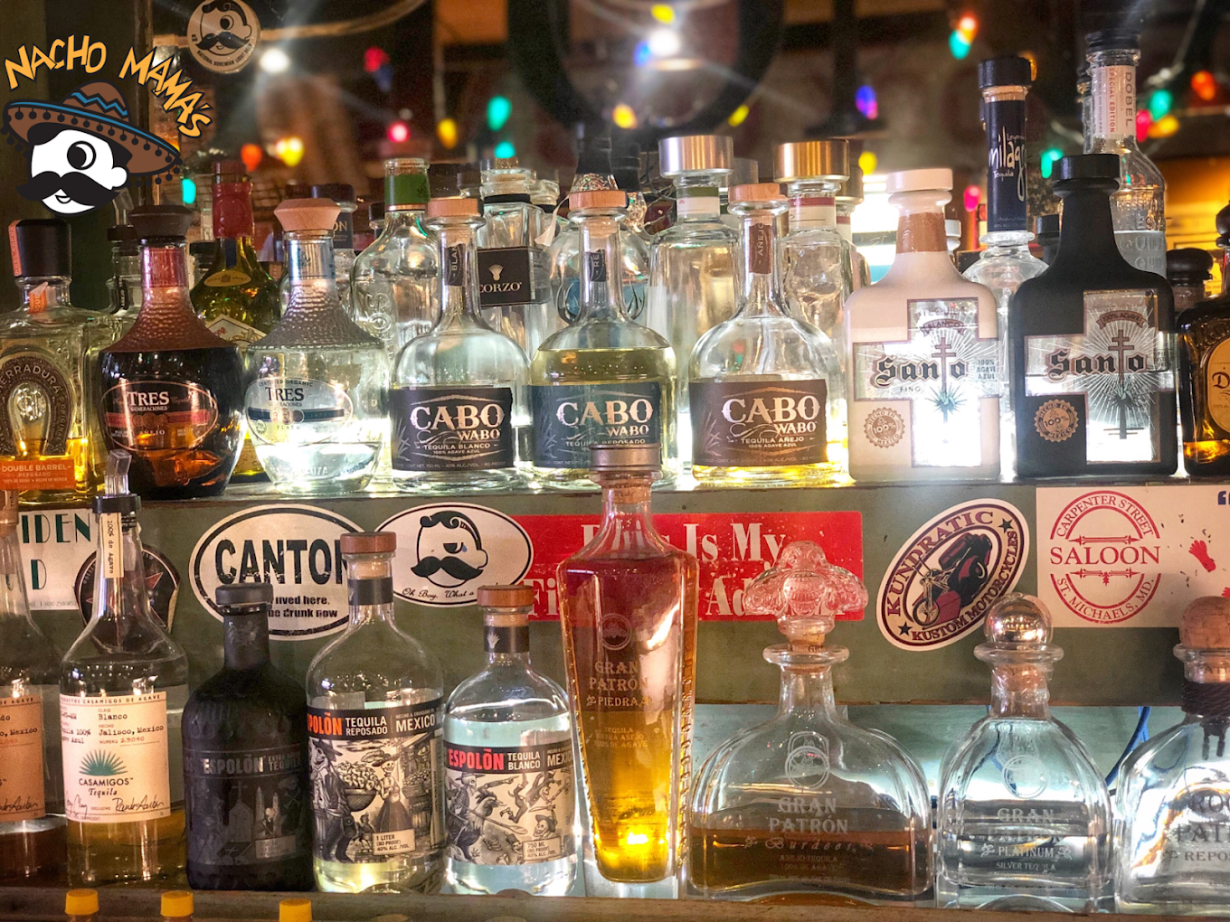 Line up of liquor bottles bend the bar