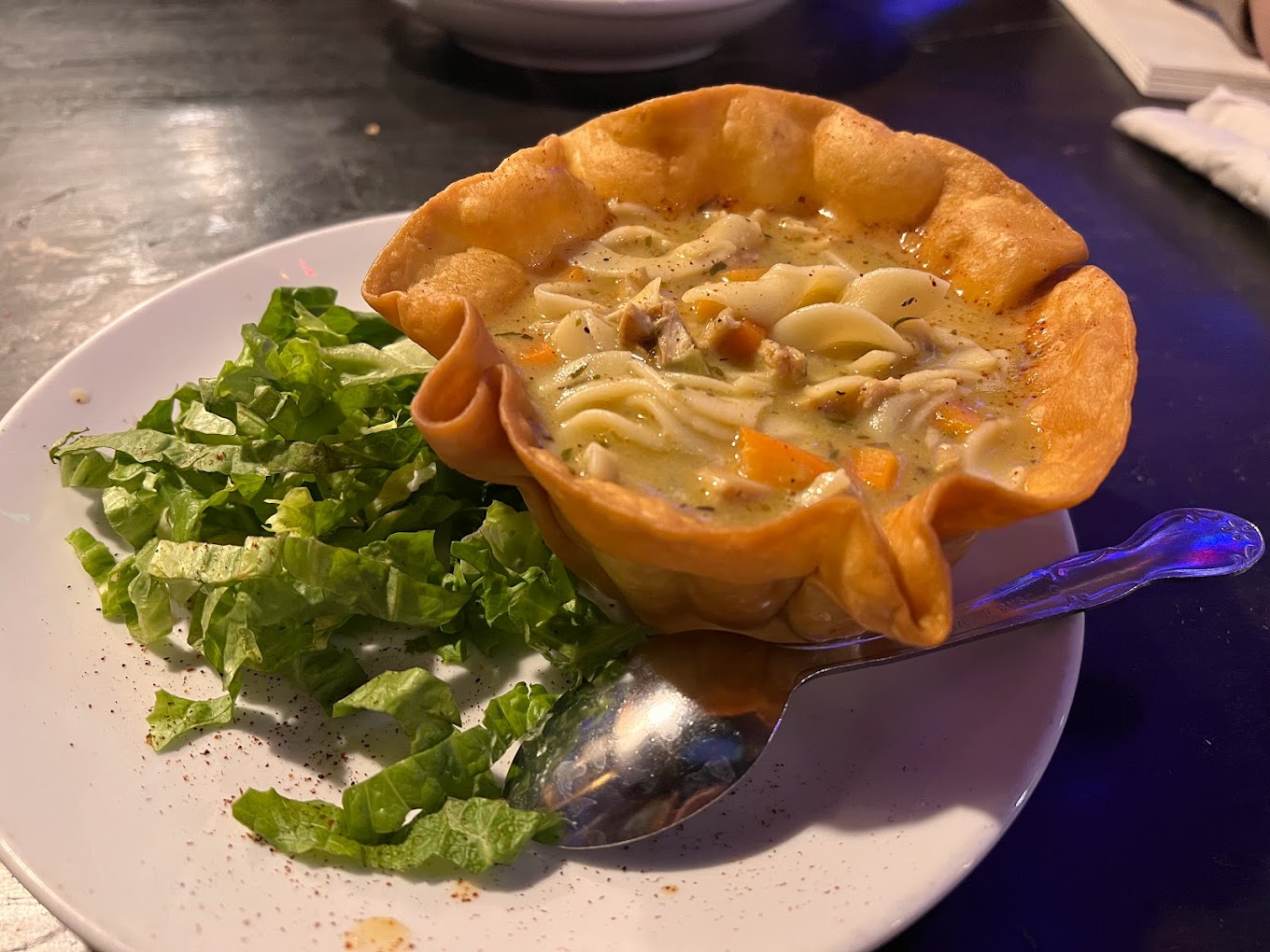 Chicken soup in a tortilla bowl
