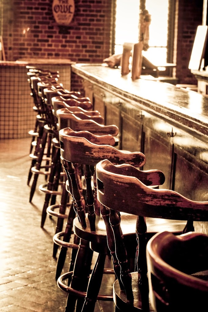 Interior of The Owl Bar, bar stools