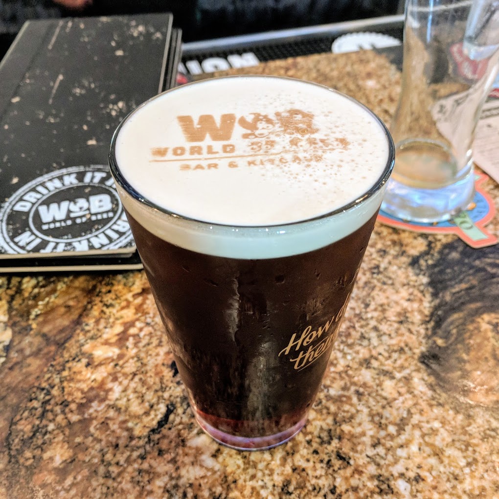 Pint with World of Beer Logo in the foam