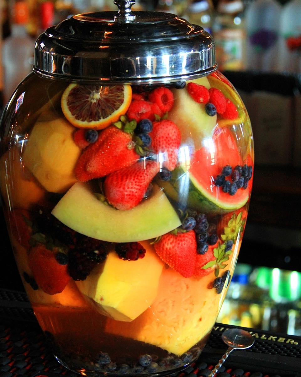 a jug of "Cowboy Juice" which has seven fruits and seven rums
