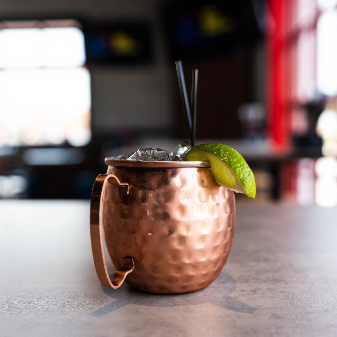 a Tito's American mule in a copper mug with a lime wedge